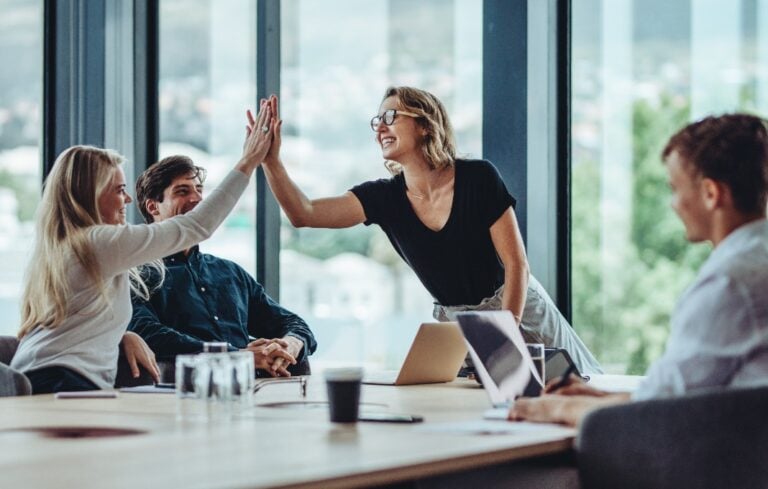 Group of colleagues celebrating success