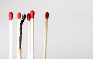 One burned match among five unburned matches